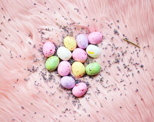 easter eggs on pink fur pastel colors